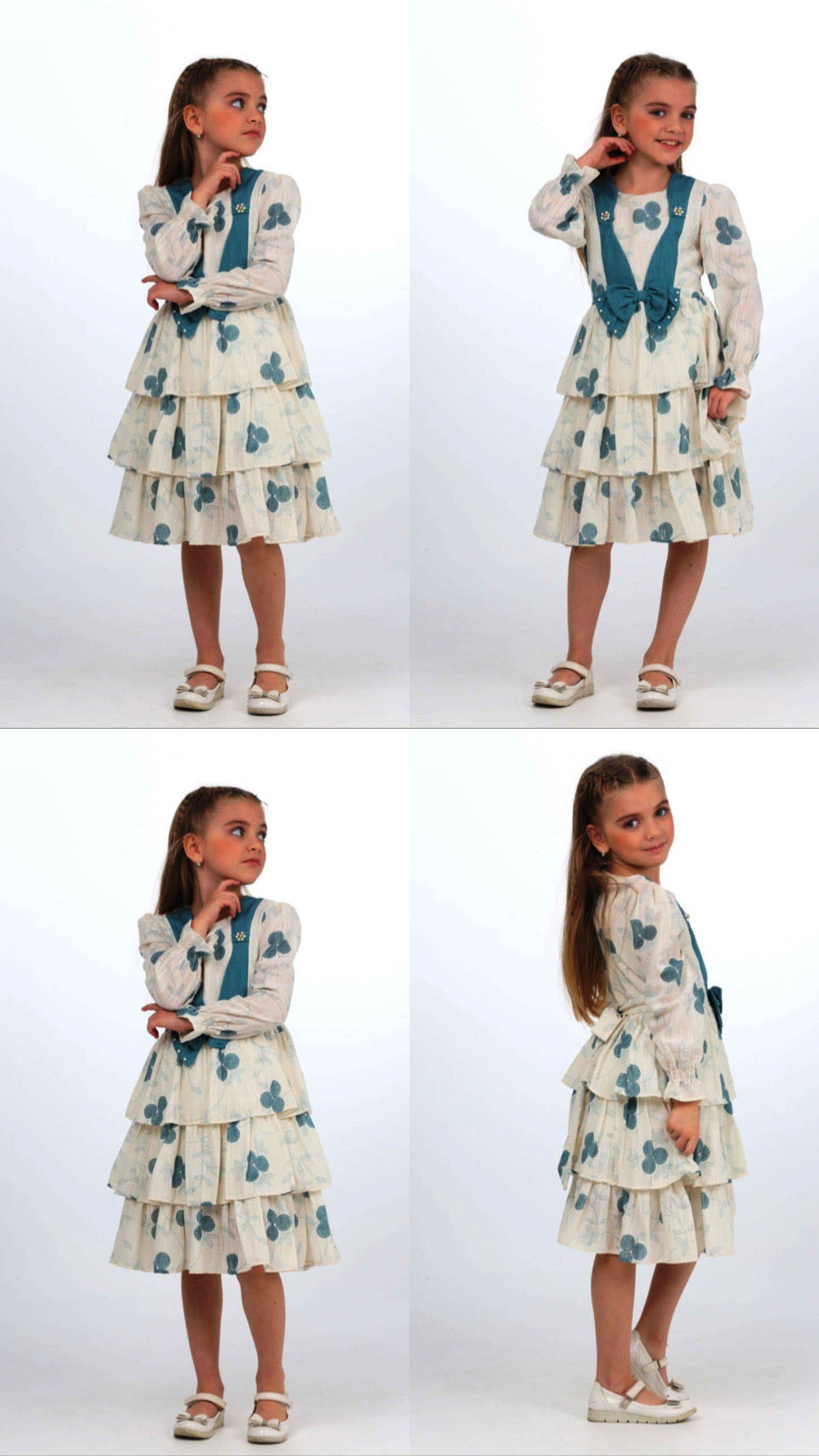 TRENDT MODA ÖNÜ FİYONKLU İNCİLİ ASTARLI KREM ÜZERİNE MAVİ ÇİÇEKLİ ELBİSE