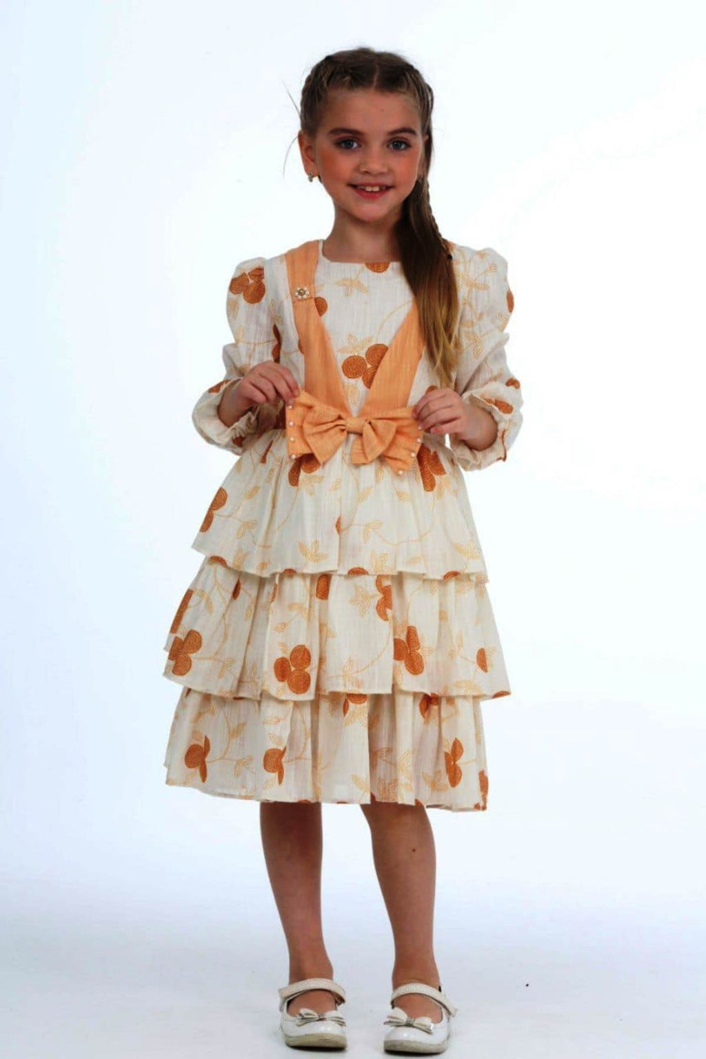 TRENDT MODA ÖNÜ FİYONKLU İNCİLİ ASTARLI KREM ÜZERİNE SARI ÇİÇEKLİ ELBİSE