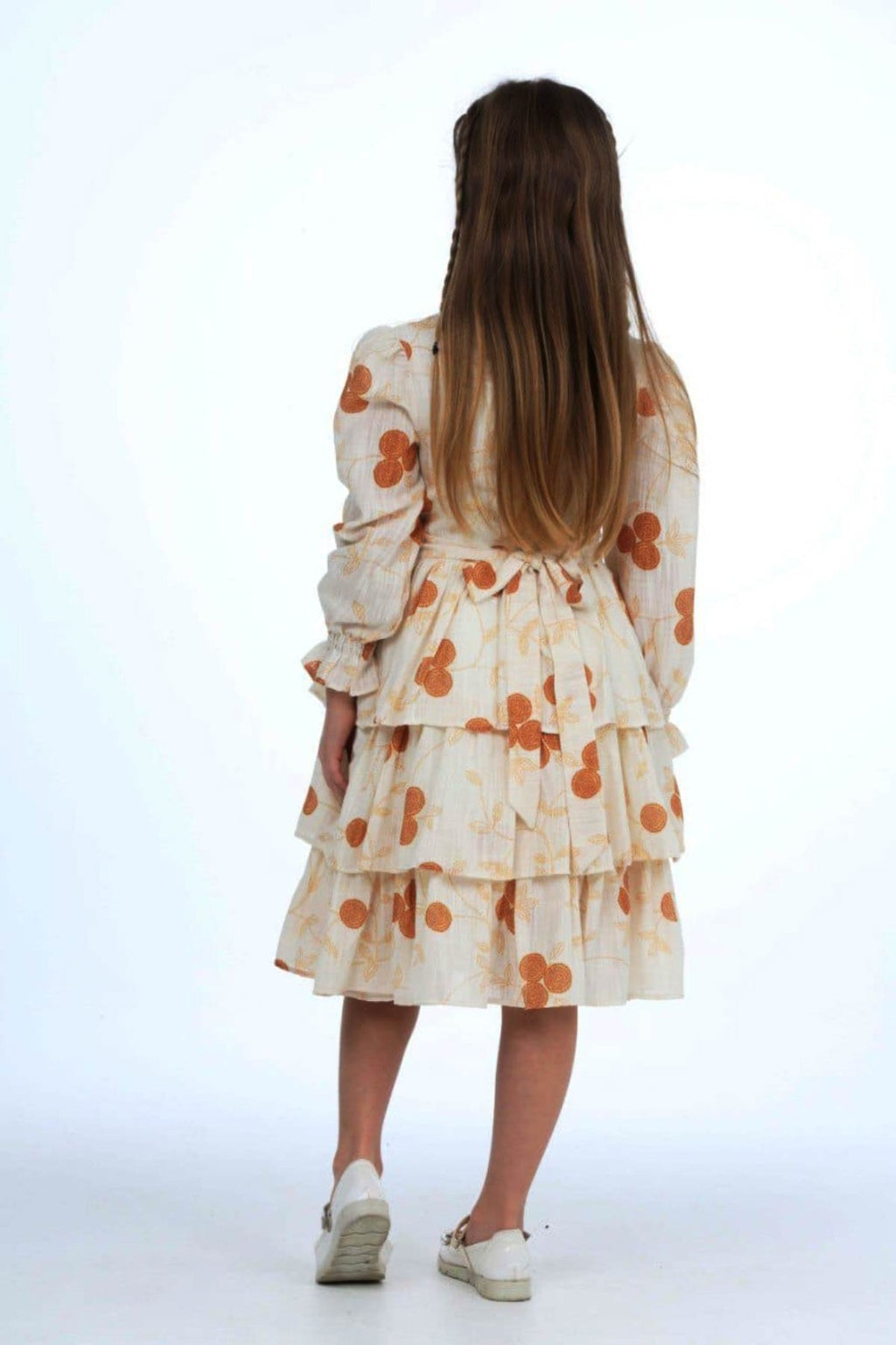 TRENDT MODA ÖNÜ FİYONKLU İNCİLİ ASTARLI KREM ÜZERİNE SARI ÇİÇEKLİ ELBİSE
